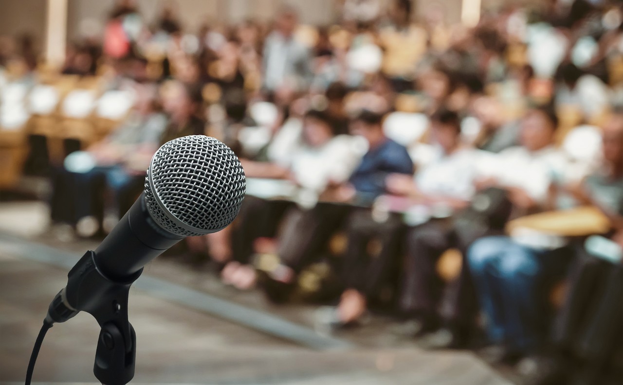 microphone in front of a crowd